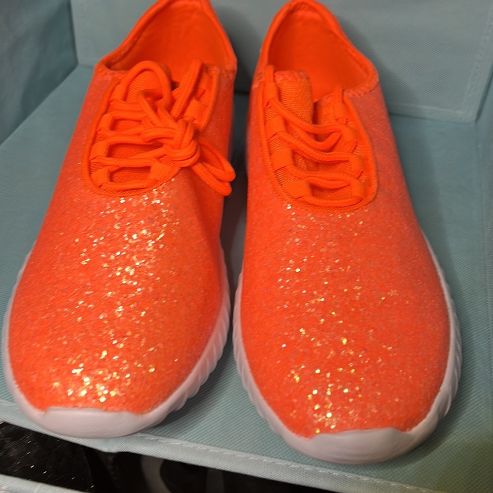 The pictures don’t do the sparkle justice. Chunky glitter, hot orange sneakers.